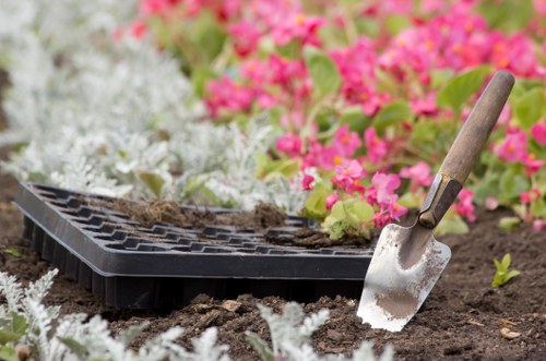 Manager checking landscaping work notes before closing a complaint